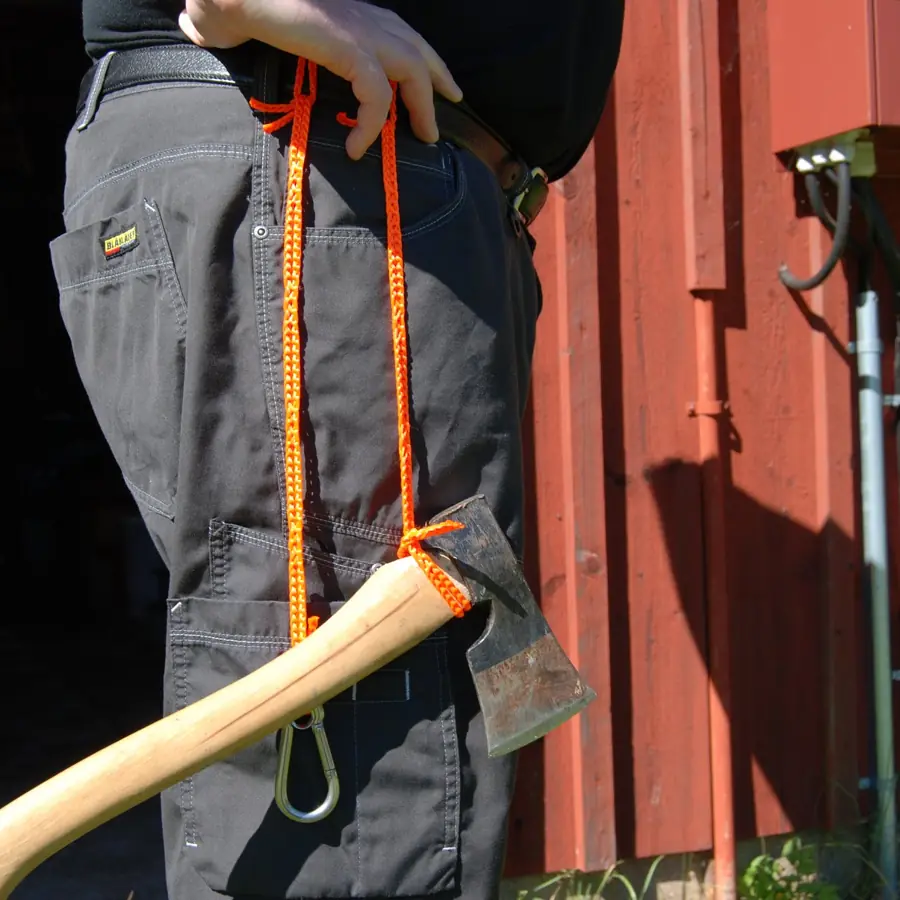 An axe carried on a RunLock sling