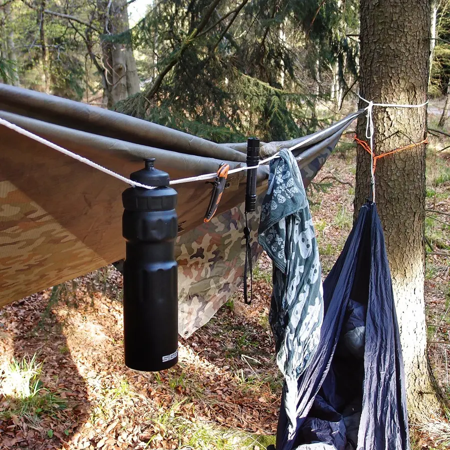 Washing hanging on a RunLock line between trees at a camp